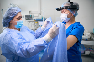 Healthcare workers putting on PPE