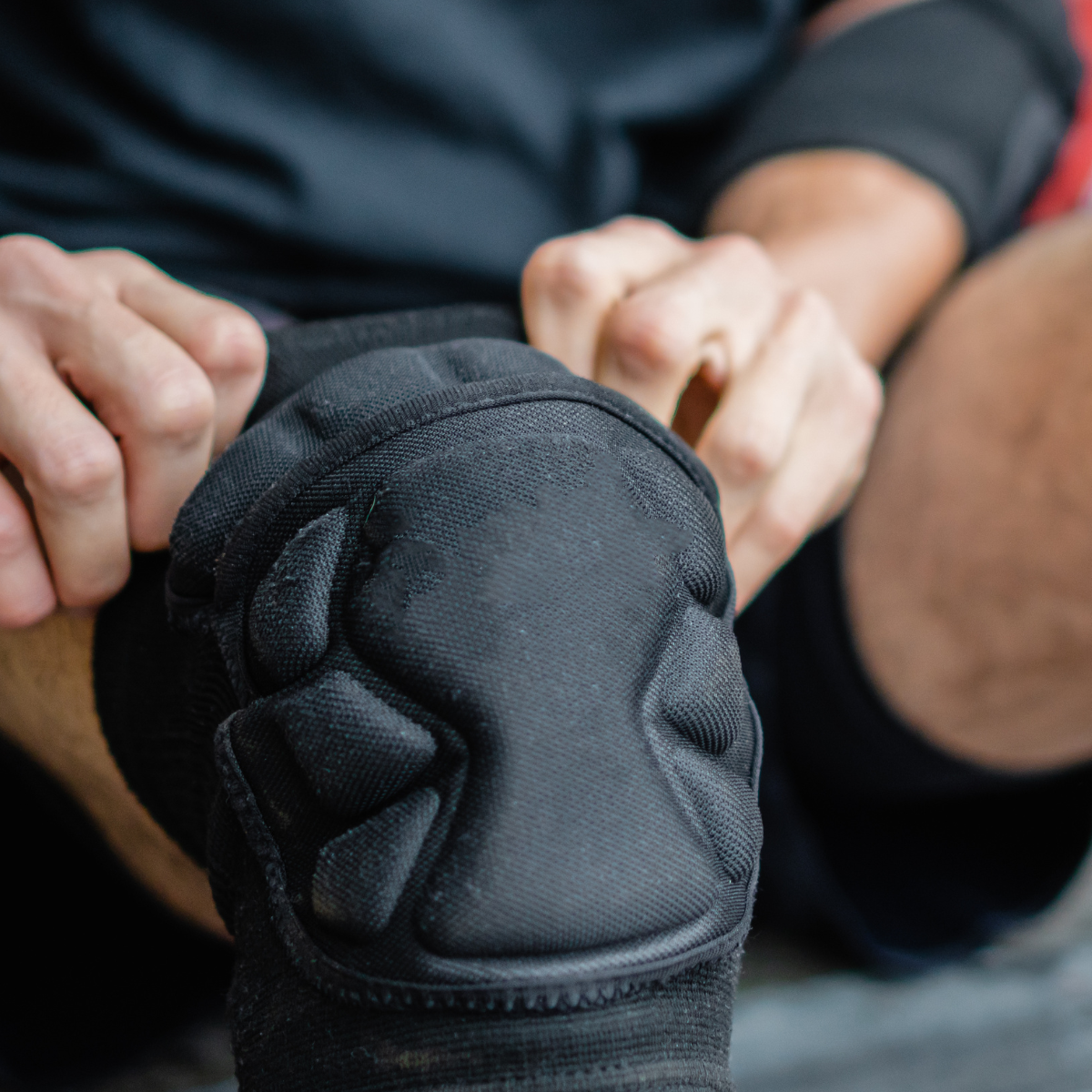 Person fitting kneepads