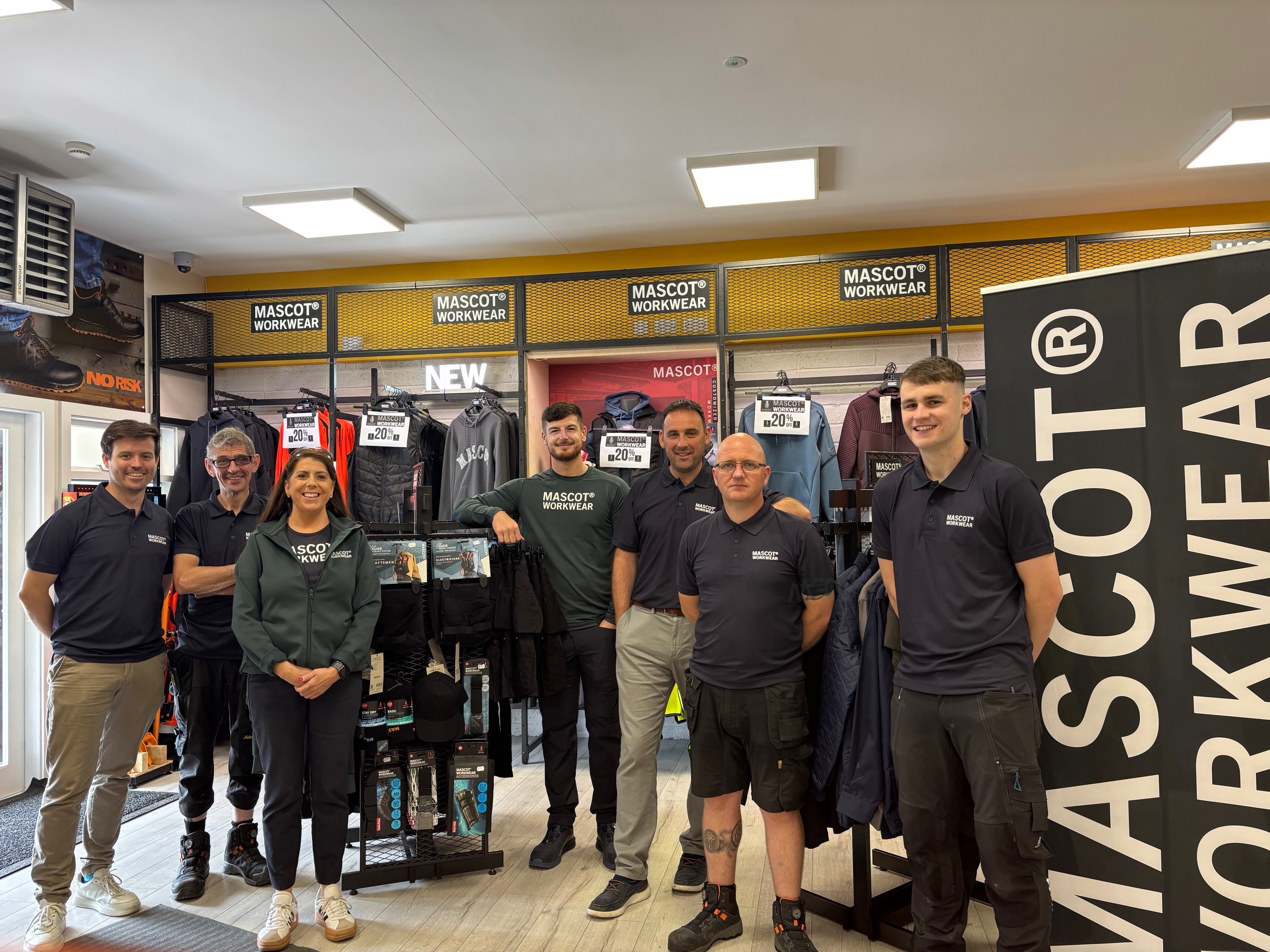 Staff in front of the MASCOT Workwear stand.